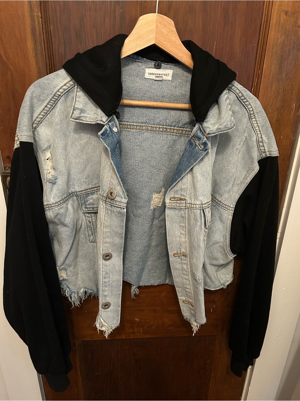 Distressed Light Blue Denim Jacket with Black Hoodie Sleeves